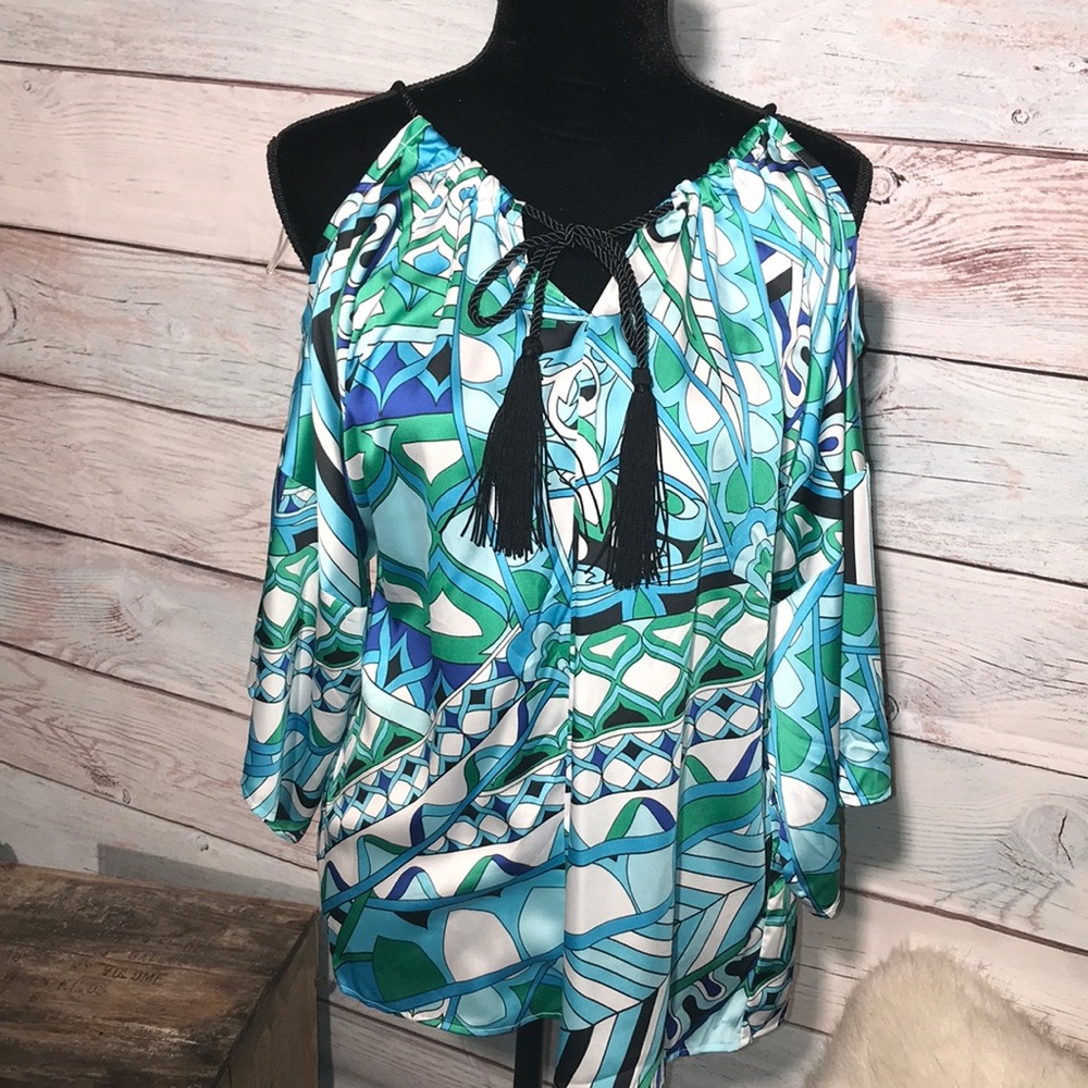 Chico’s size 0 cold shoulder blouse.